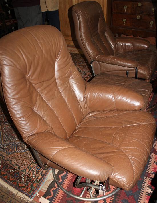 Soderbergs, Sweden, a pair of leather and chrome swivel chairs and a stool